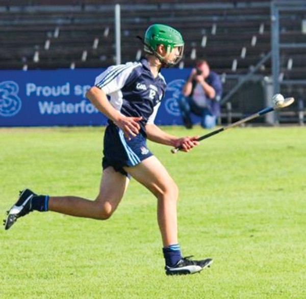 Pictured Above: Colm O’Briain storms out of defence for Dublin’s U14 hurlers. 