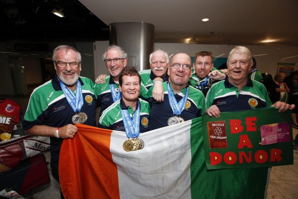 *** NO REPRODUCTION FEE *** DUBLIN : 17/7/2016 : A large gathering of family, friends and supporters armed with flags and banners greeted Transplant Team Ireland when they arrived into Dublin airport after competing in the 9th European Transplant & Dialysis Sports Championships in Vantaa, Finland. They brought with them a large haul of medals including 21 Gold, 19 Silver and 29 Bronze.  This placed Ireland’s 28 strong team in fifth position on the medals table with host country Finland, and a much larger team of 96 athletes, taking top position out of 24 competing countries. In second place was Hungary, followed by Great Britain and then Germany. Transplant Team Ireland is managed by the Irish Kidney Association. Pictured was Transplant Team Ireland’s dublin members Mike Dwyer, Ron Granger, Deirdre Faul, Harry Ward, Peter Heffernan, Lenny Ryan, Paul Prendergast. Picture Conor McCabe Photography. MEDIA CONTACT : Gwen O’Donoghue, Connect Communications, mob. 086 8241447 email. gwenodonoghue1@gmail.com