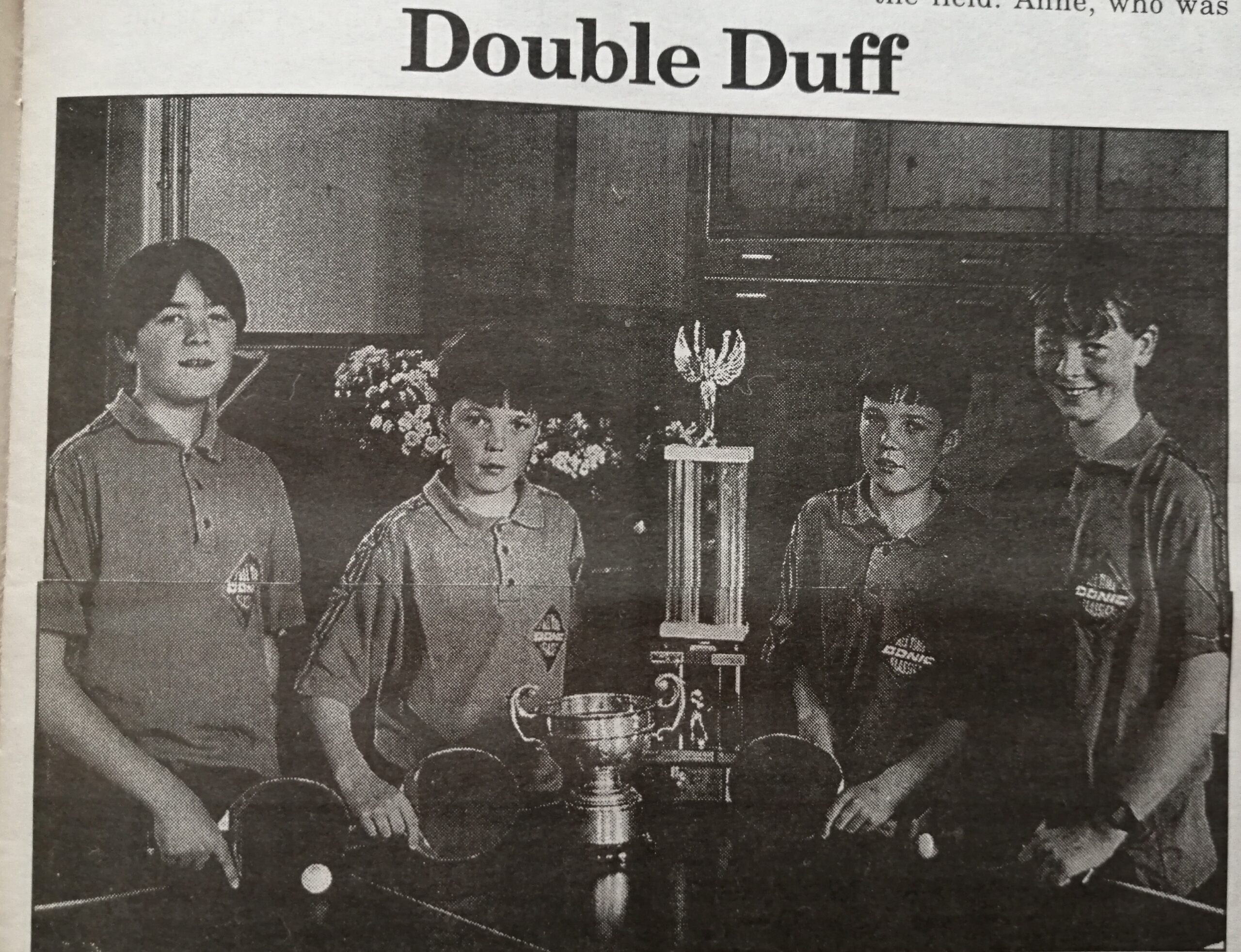 Ciaran Doyle, Graham Duff, Eric Duff and Conor McNamara with their many table tennis trophies