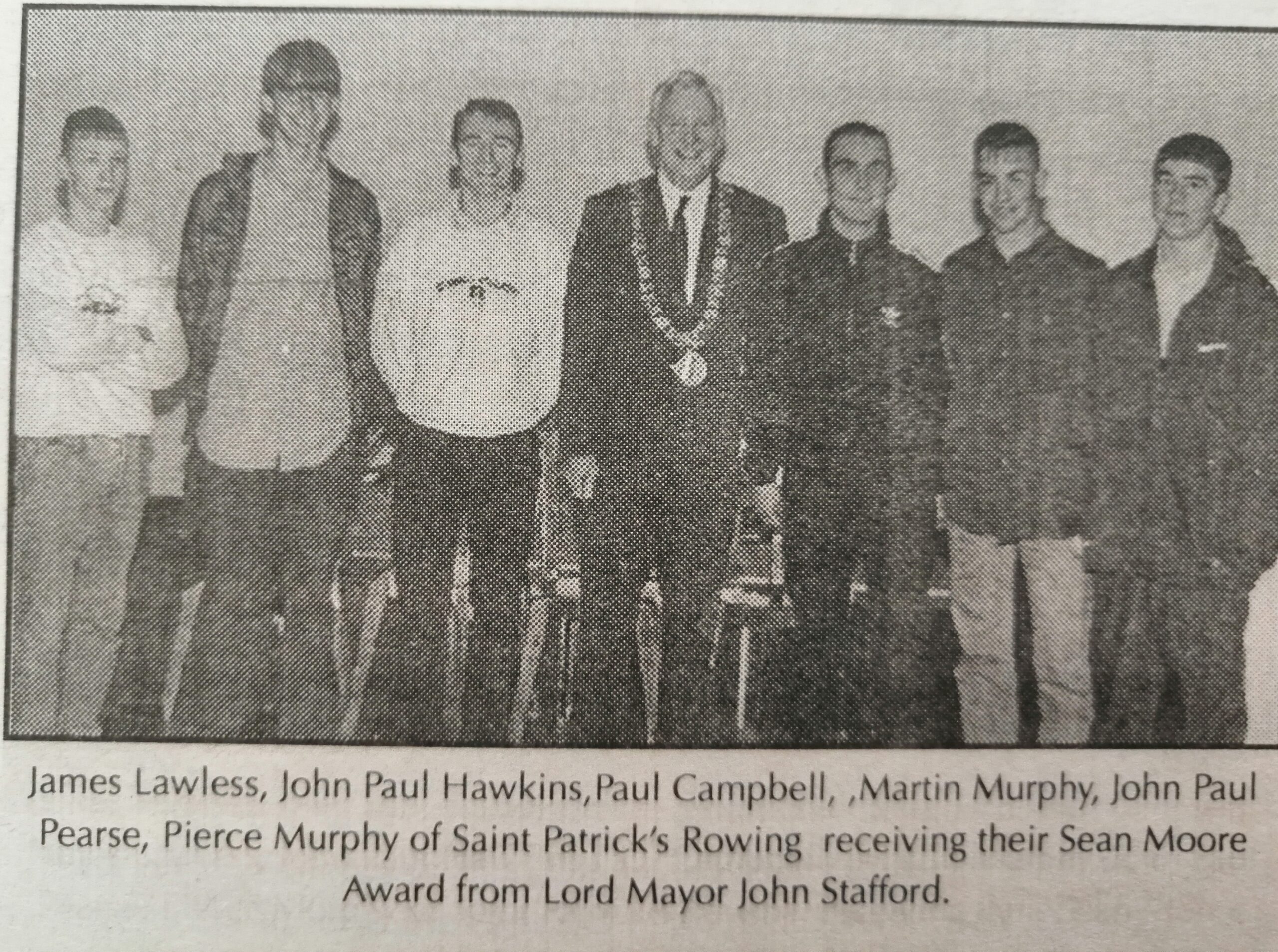 The crew from St Patrick’s Rowing Club receive their Sean Moore Award